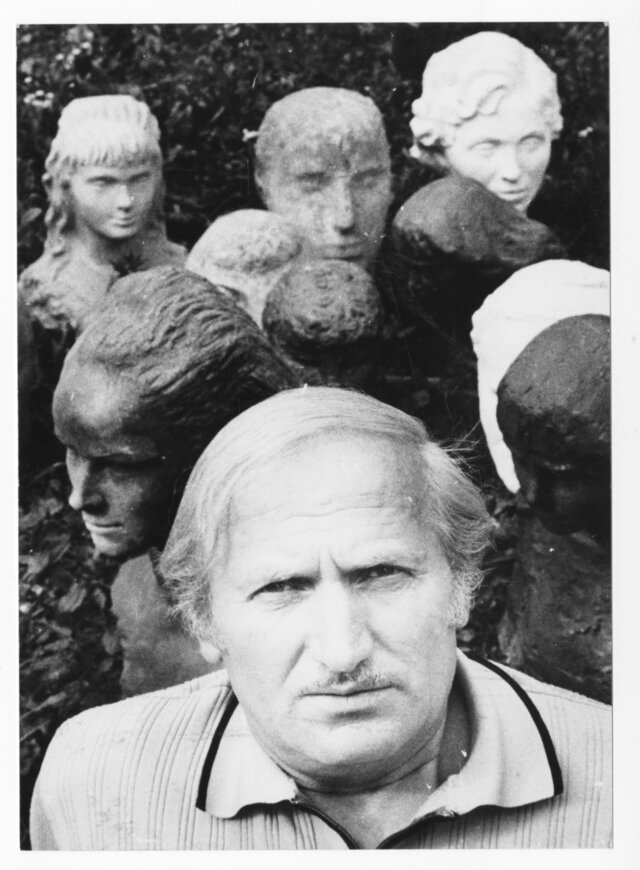 Portrait of Stanisław Strzyżyński among his sculptures
